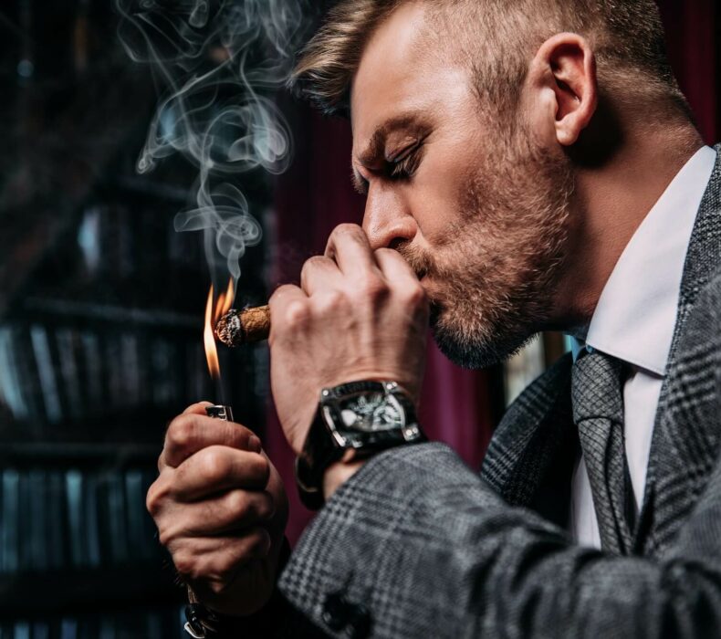 How to hold a cigar in your mouth
